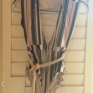 Classic Black and Cream One Piece Swimsuit with Wrap Design